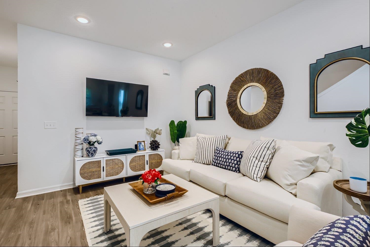 83 Pamplona Drive St. Augustine, FL 32086 - Photo 8 of 66 a living room with furniture and a flat screen tv