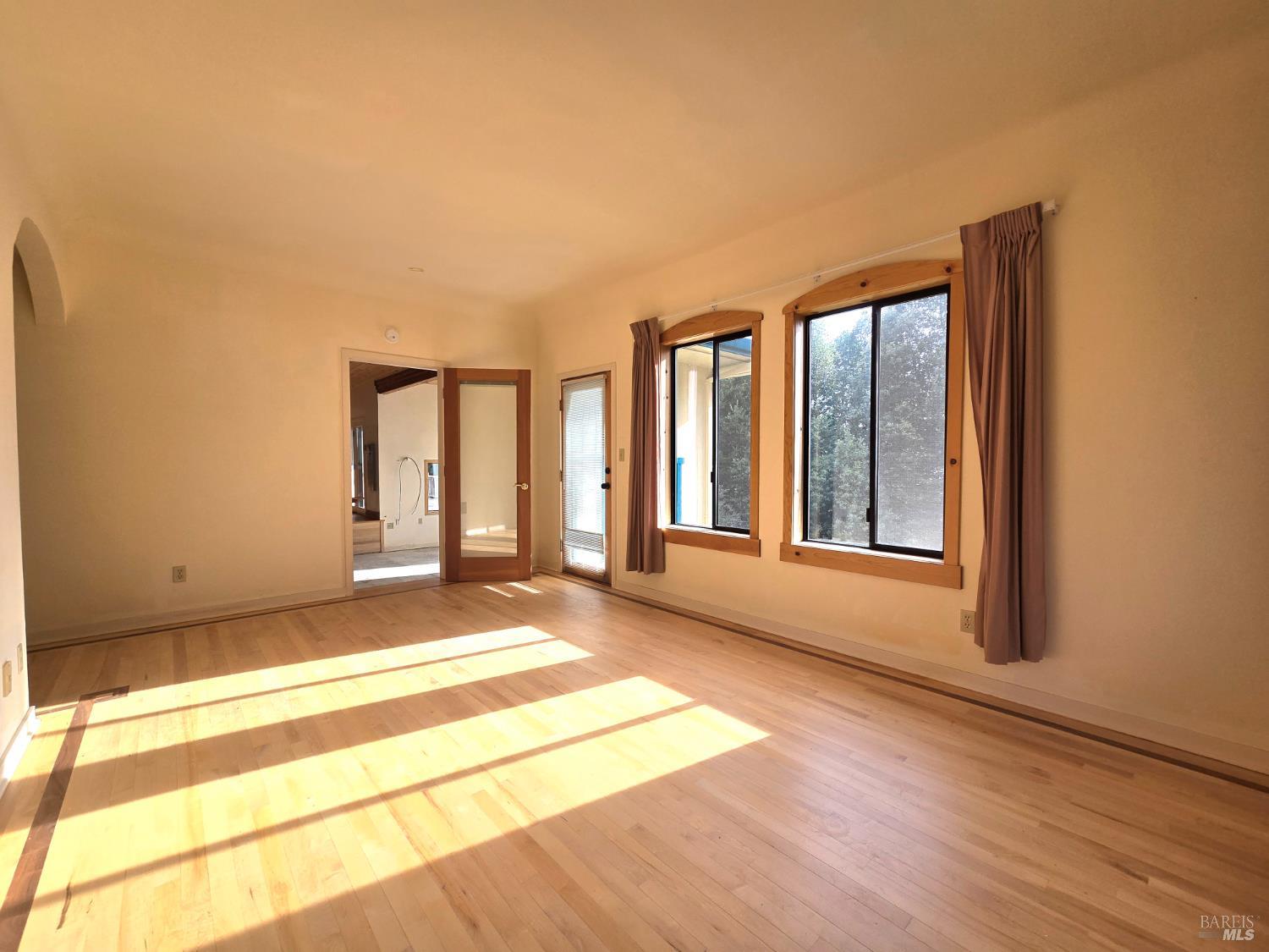 36955 Eureka Stagecoach Road Willits, CA 95490 - Photo 20 of 46 a view of an empty room with window and a kitchen