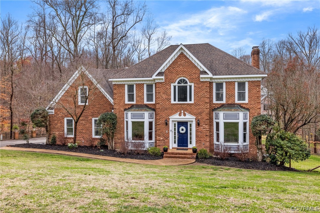 3200 Summerhurst Drive Midlothian, VA 23113 - Photo 1 of 50 a front view of a house with a yard