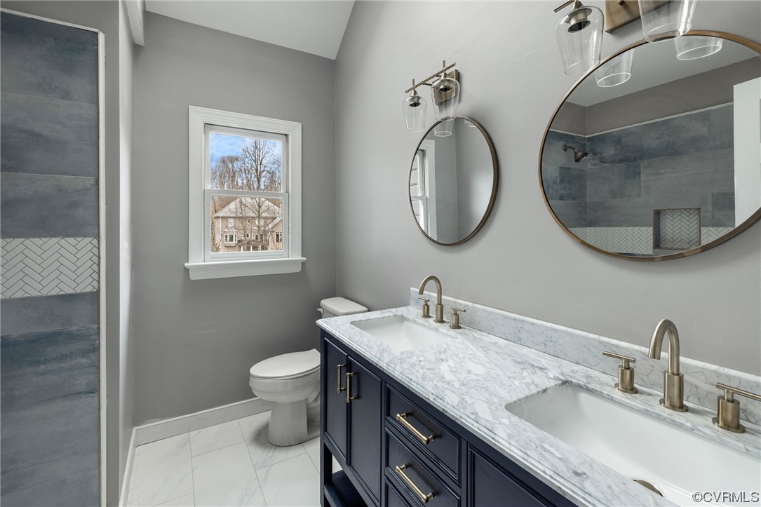 3200 Summerhurst Drive Midlothian, VA 23113 - Photo 25 of 50 a bathroom with a granite countertop toilet a sink and a mirror