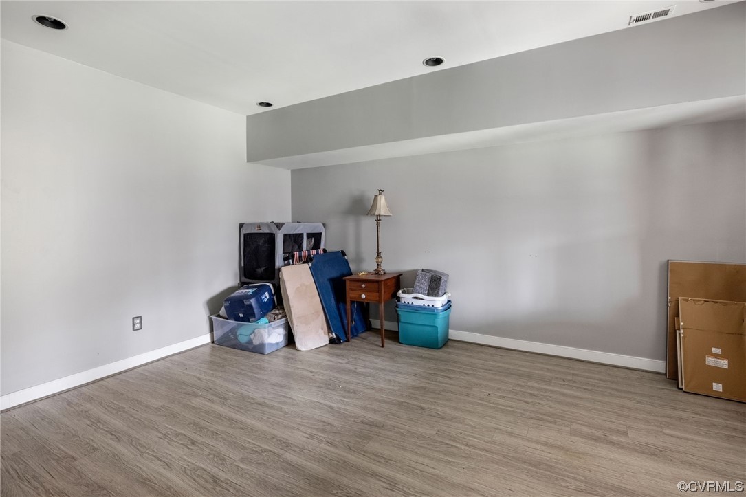 3200 Summerhurst Drive Midlothian, VA 23113 - Photo 37 of 50 a room with wooden floor and furniture