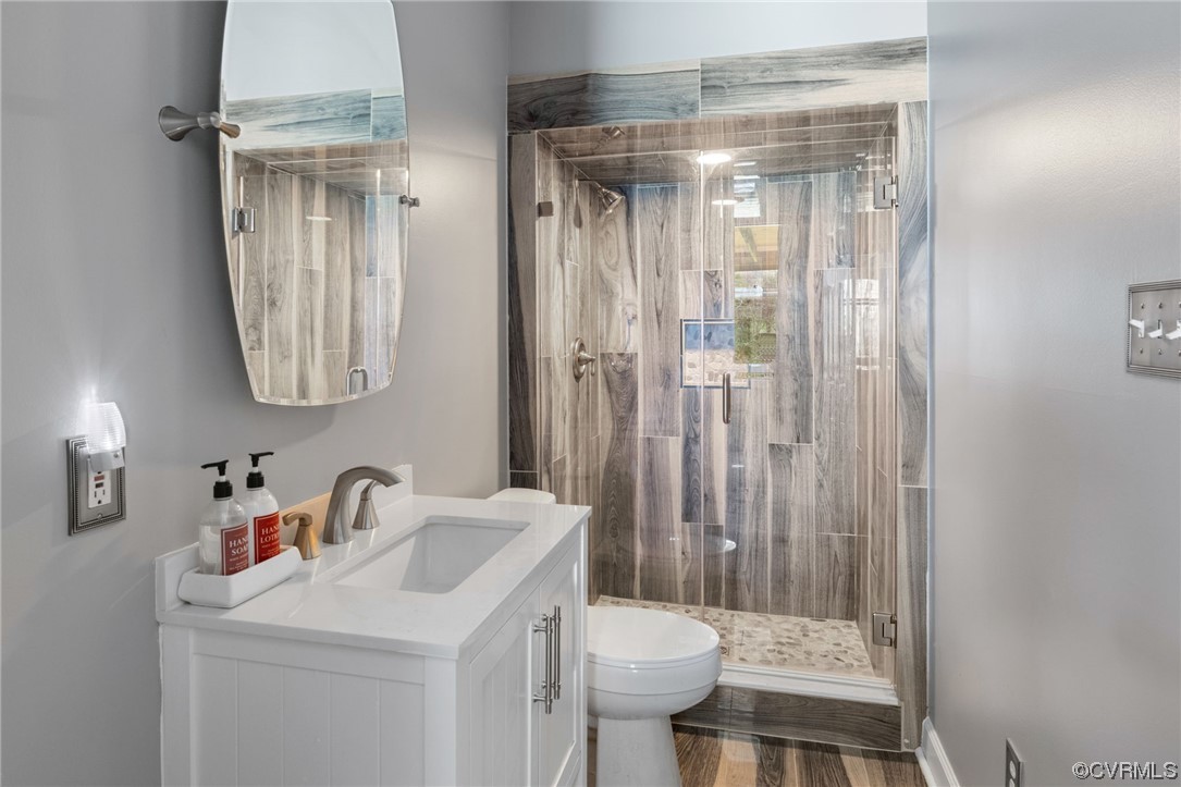 3200 Summerhurst Drive Midlothian, VA 23113 - Photo 38 of 50 a bathroom with a sink a toilet and shower