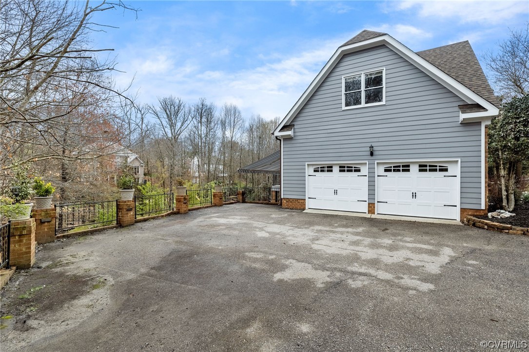 3200 Summerhurst Drive Midlothian, VA 23113 - Photo 50 of 50 a view of a house with a yard and garage