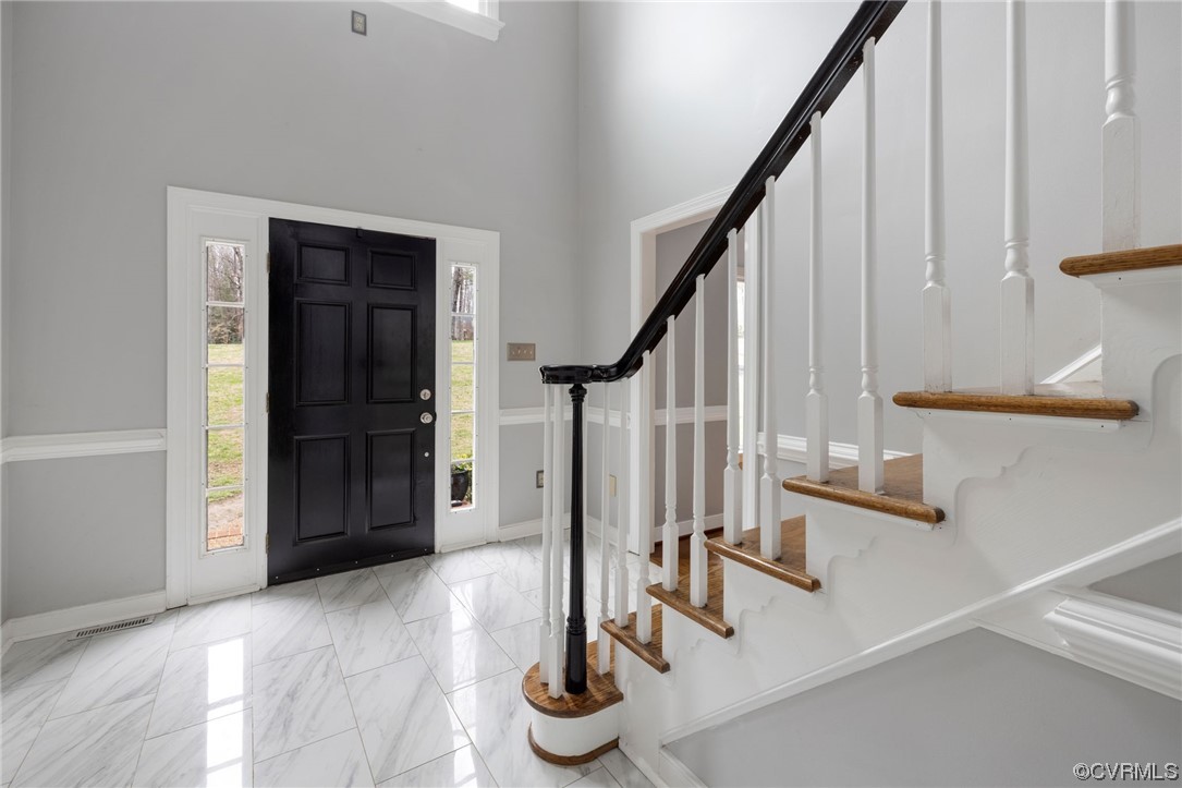 3200 Summerhurst Drive Midlothian, VA 23113 - Photo 7 of 50 a view of entryway with wooden floor and stairs