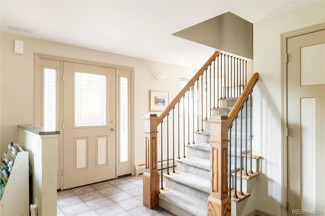a view of an entryway with staircase