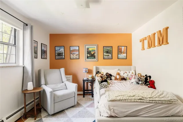 a bed room with a bed and a couch