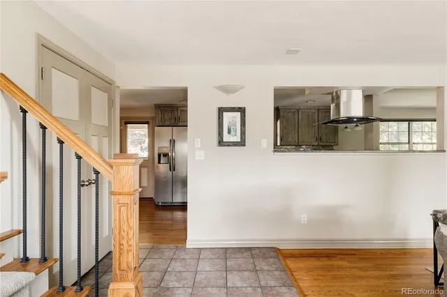 a view of a living room with a fireplace