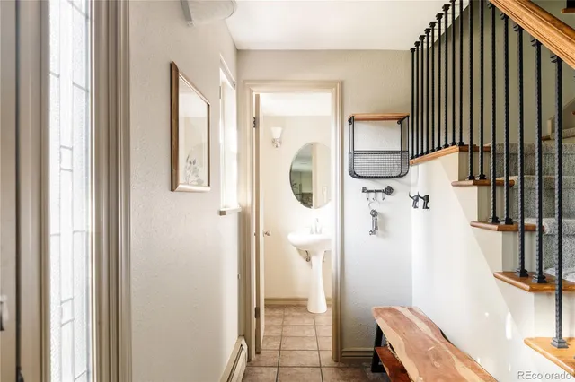 a bathroom with a mirror and a shower