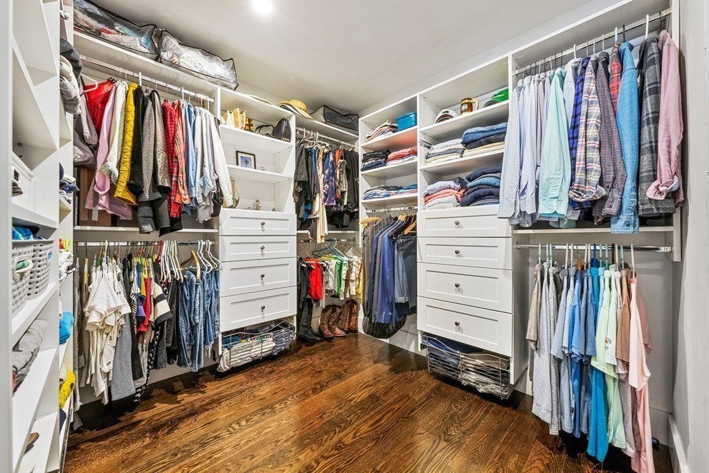 211 West Canton Street, Unit 1 Boston, MA 02116 - Photo 13 of 33 a view of walk in closet with clothes and shoes