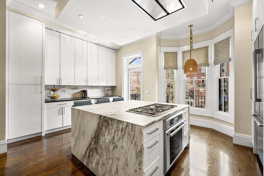 211 West Canton Street, Unit 1 Boston, MA 02116 - Photo 2 of 33 a kitchen with a stove and a sink