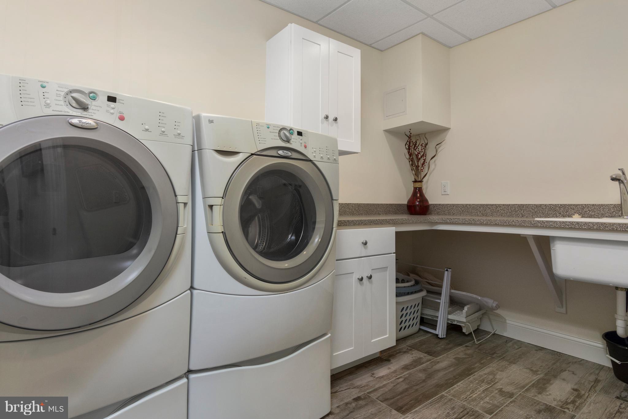 798 Governor Bridge Road Davidsonville, MD 21035 - Photo 26 of 30 Large laundry room w/ storage & folding area