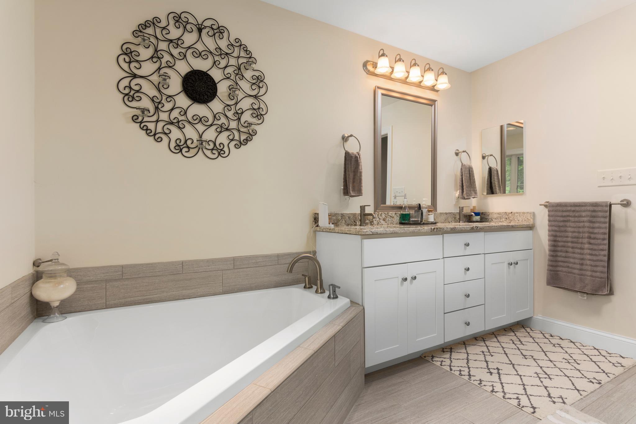 798 Governor Bridge Road Davidsonville, MD 21035 - Photo 4 of 30 Master Bath (1 of 3) has tub, tile & granite