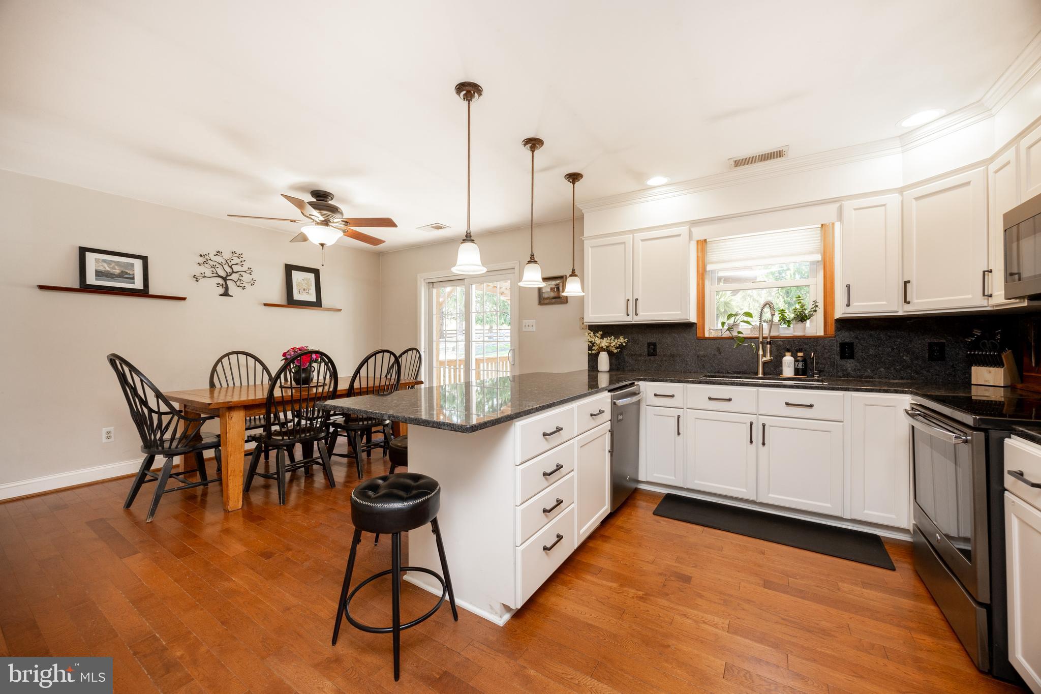 337 Saw Mill Road Pottstown, PA 19465 - Photo 10 of 57 a kitchen with stainless steel appliances granite countertop a stove a sink and a refrigerator