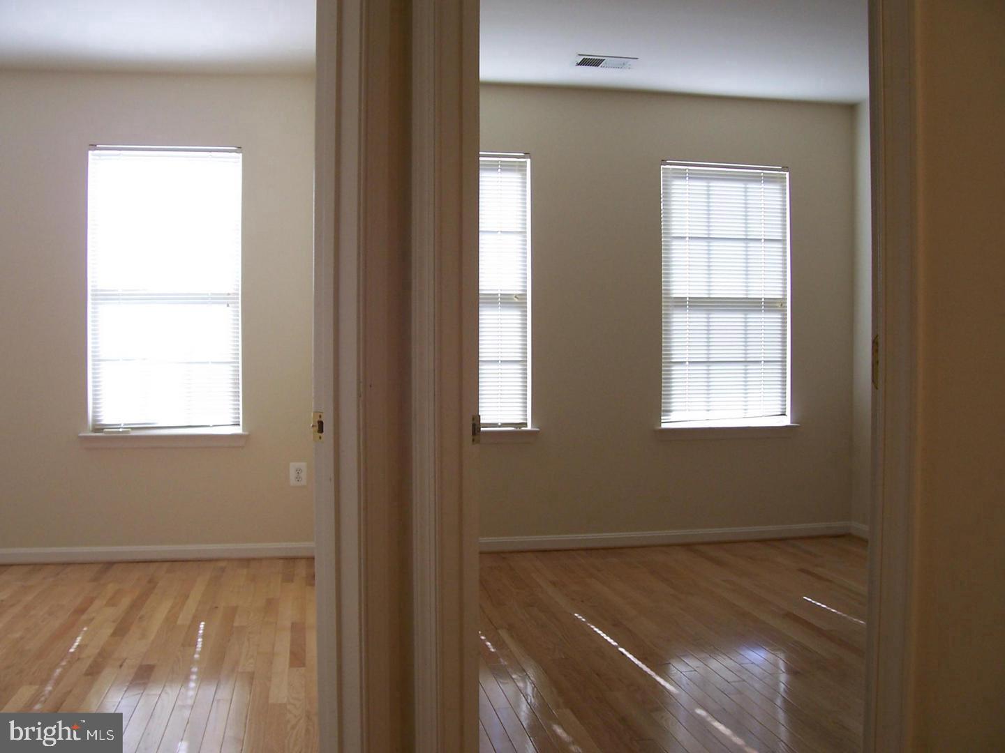 46378 Monocacy Square, Unit 86 Sterling, VA 20165 - Photo 4 of 22 a view of an empty room with a window