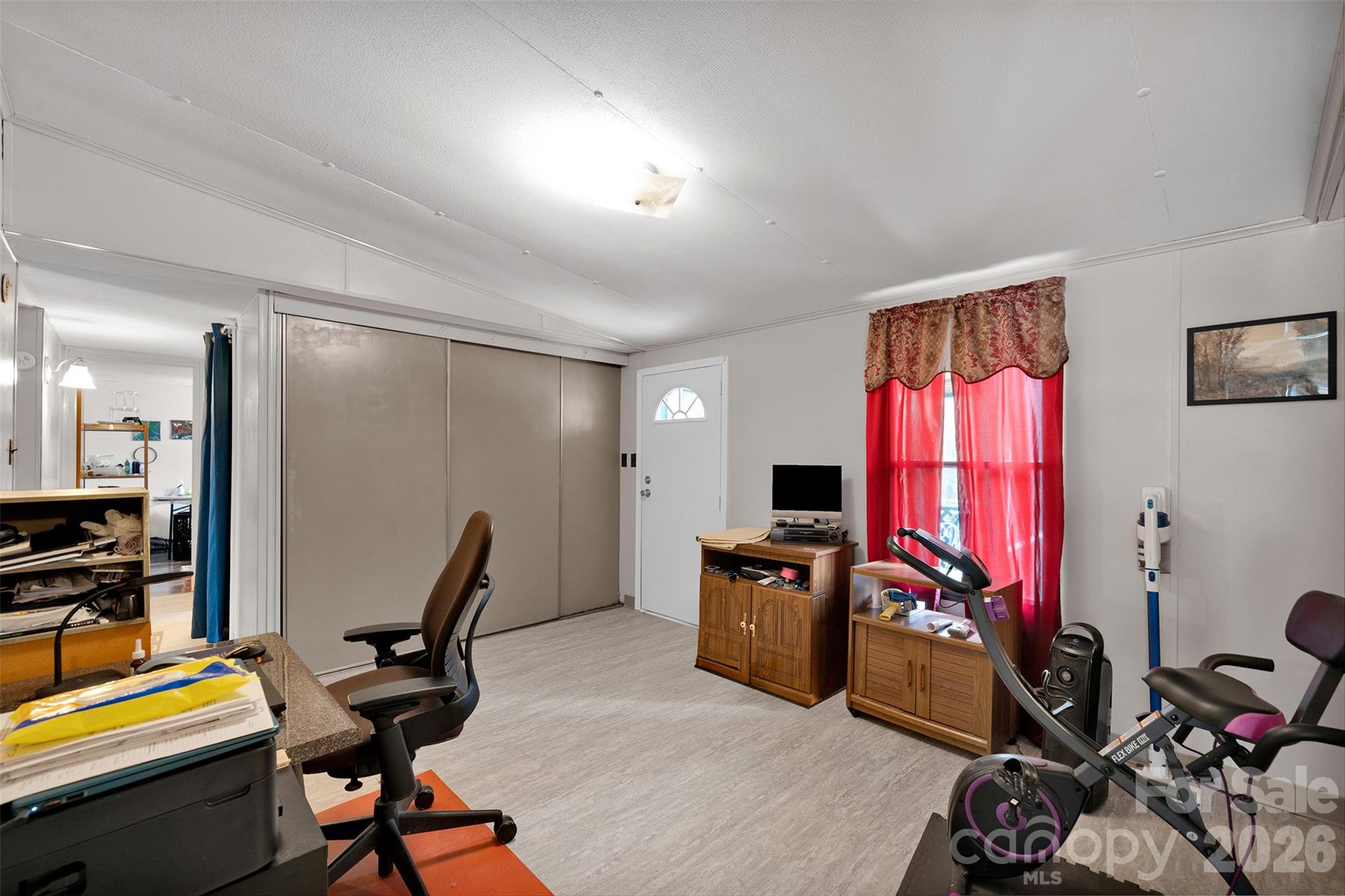 2187 McBee Highway Bethune, SC 29009 - Photo 13 of 38 a view of a workspace with furniture and a window