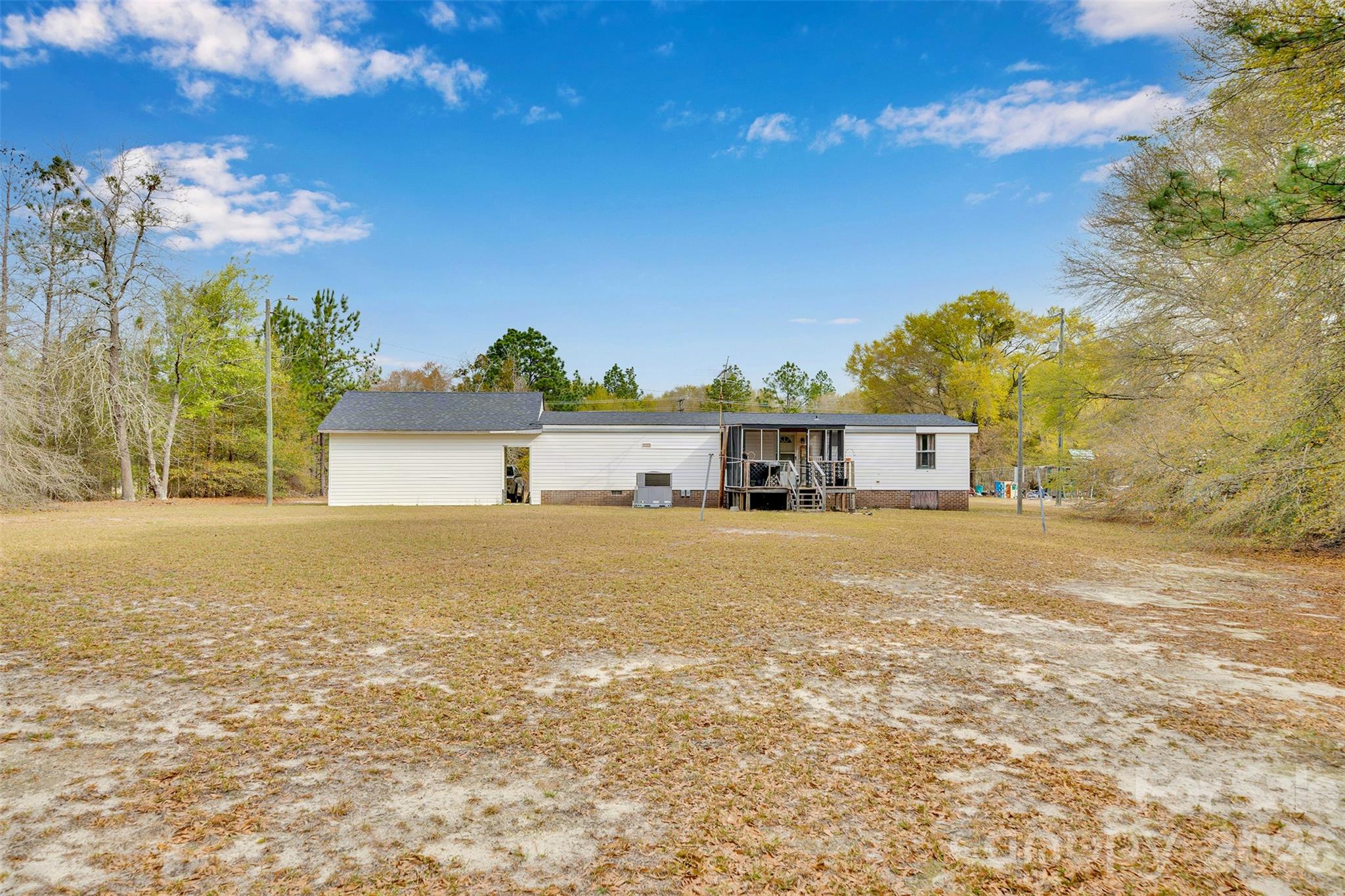 2187 McBee Highway Bethune, SC 29009 - Photo 28 of 38 a view of a house with a yard