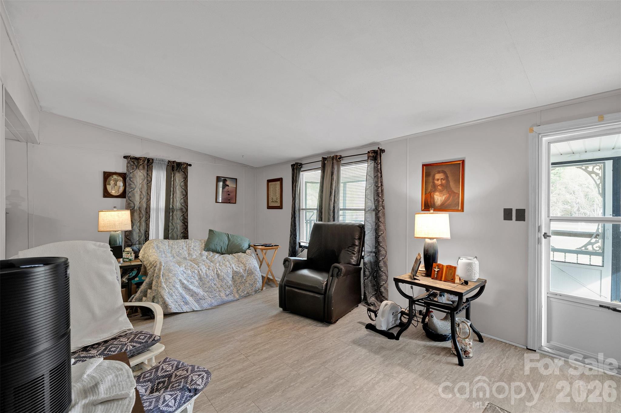 2187 McBee Highway Bethune, SC 29009 - Photo 5 of 38 a bedroom with furniture and a window