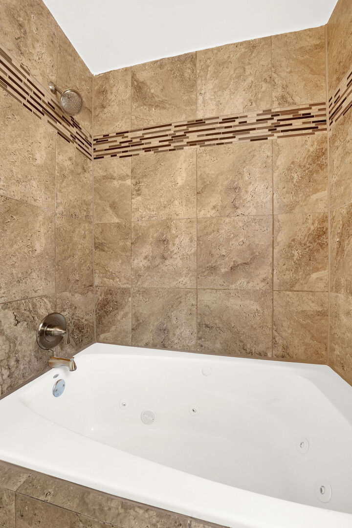 8033 South Campbell Avenue Chicago, IL 60652 - Photo 13 of 30 a bathroom with a bathtub and shower