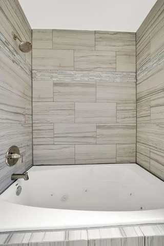 a bathroom with a bathtub