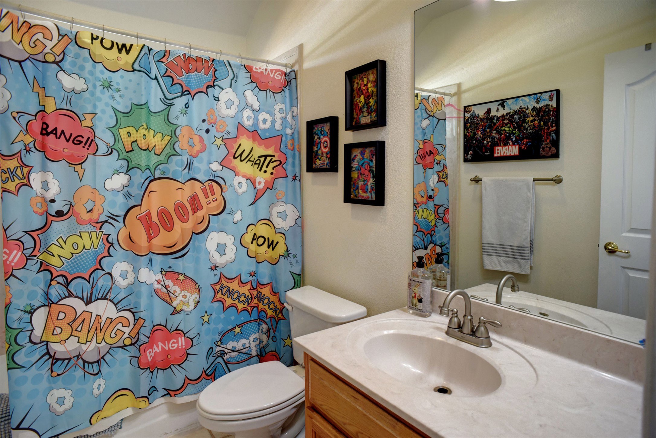 678 Ponderosa Road Bastrop, TX 78602 - Photo 22 of 40 Full bathroom with toilet, vanity, and shower / tub combo