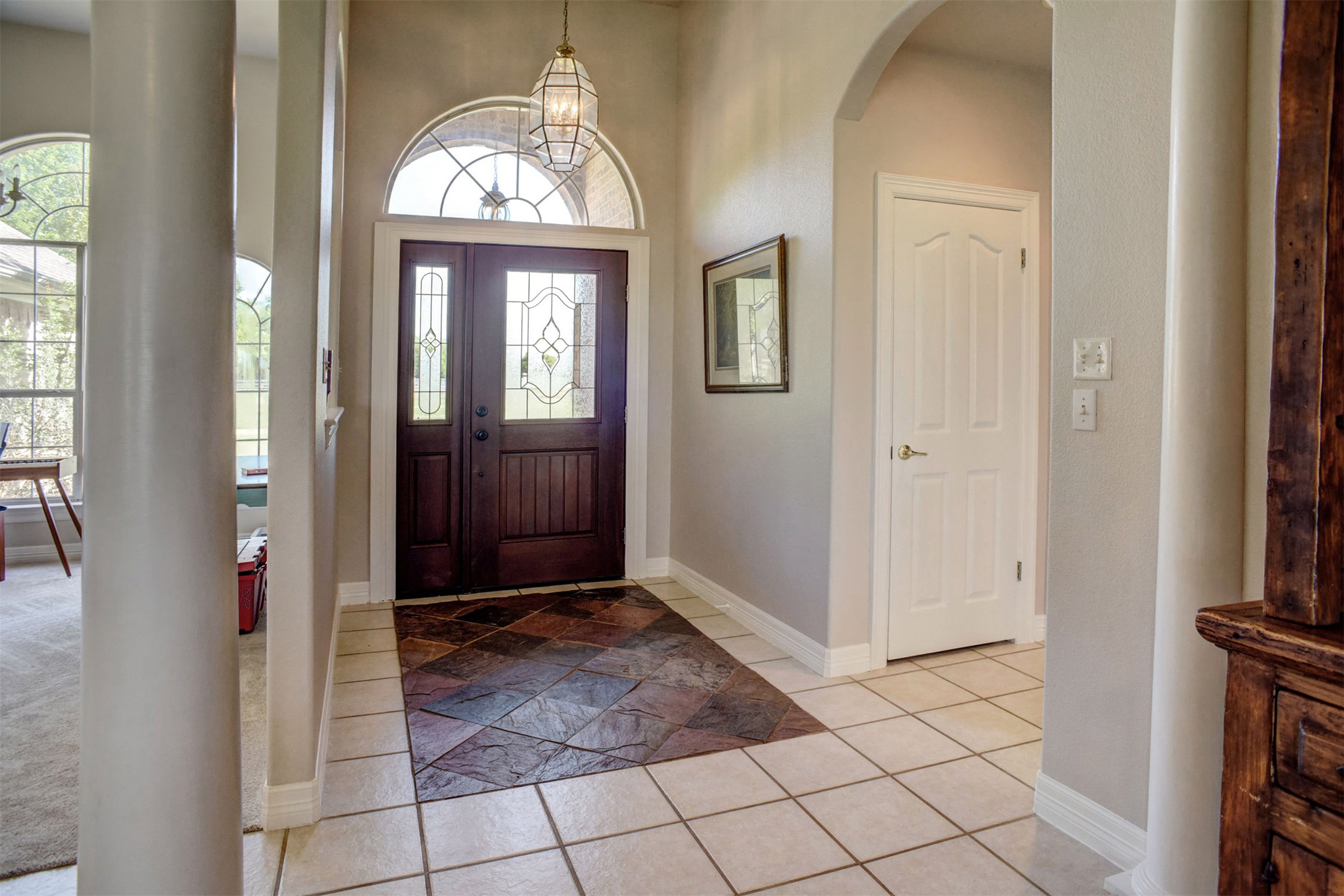 678 Ponderosa Road Bastrop, TX 78602 - Photo 5 of 40 Entryway featuring decorative columns and arches.
