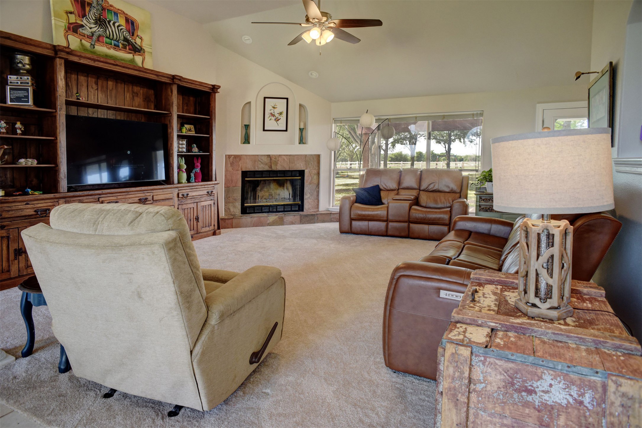 678 Ponderosa Road Bastrop, TX 78602 - Photo 6 of 40 Large living room featuring fire place.