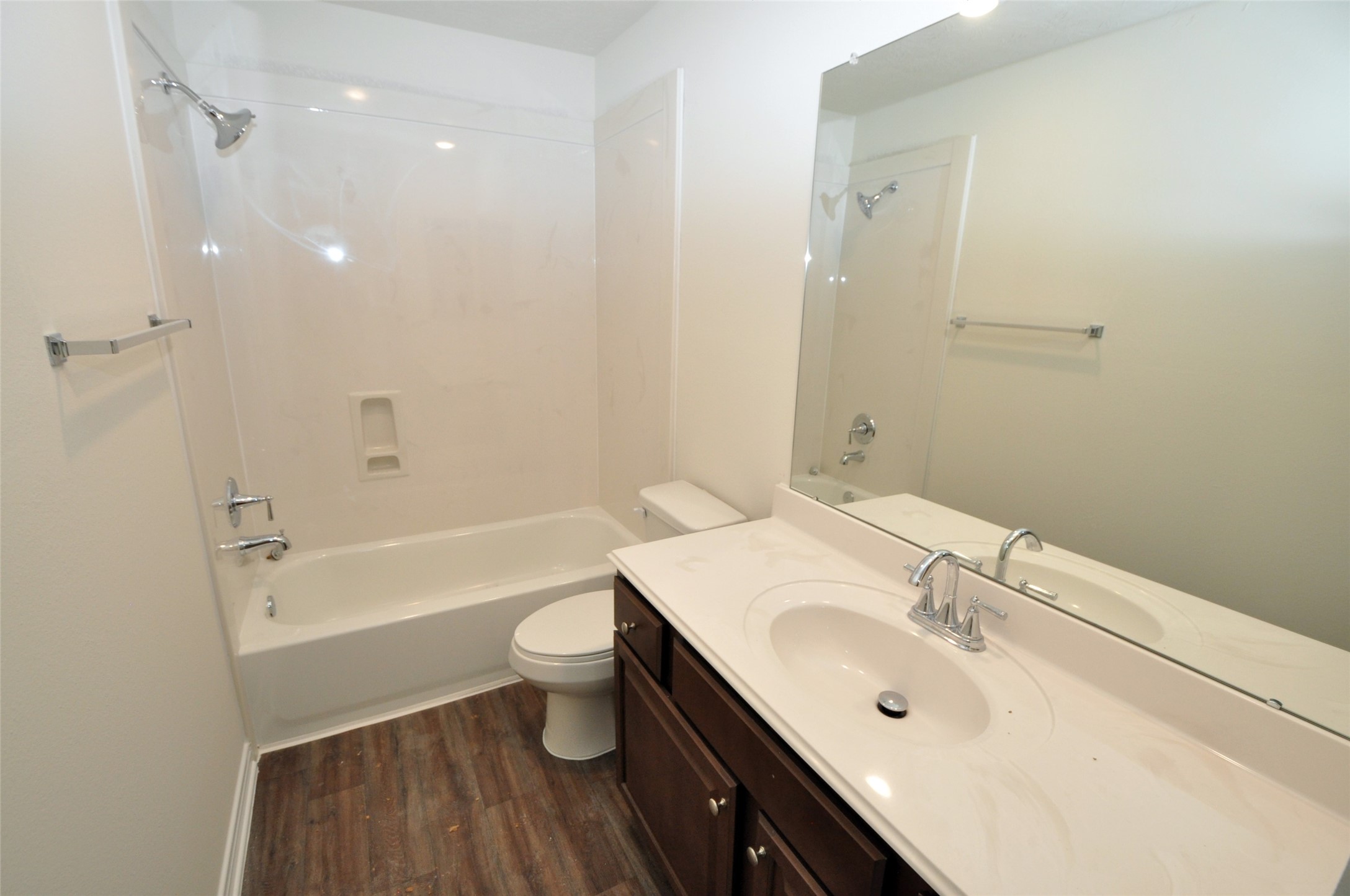 3705 Pedregal Road League City, TX 77573 - Photo 30 of 50 a bathroom with a sink a toilet and shower