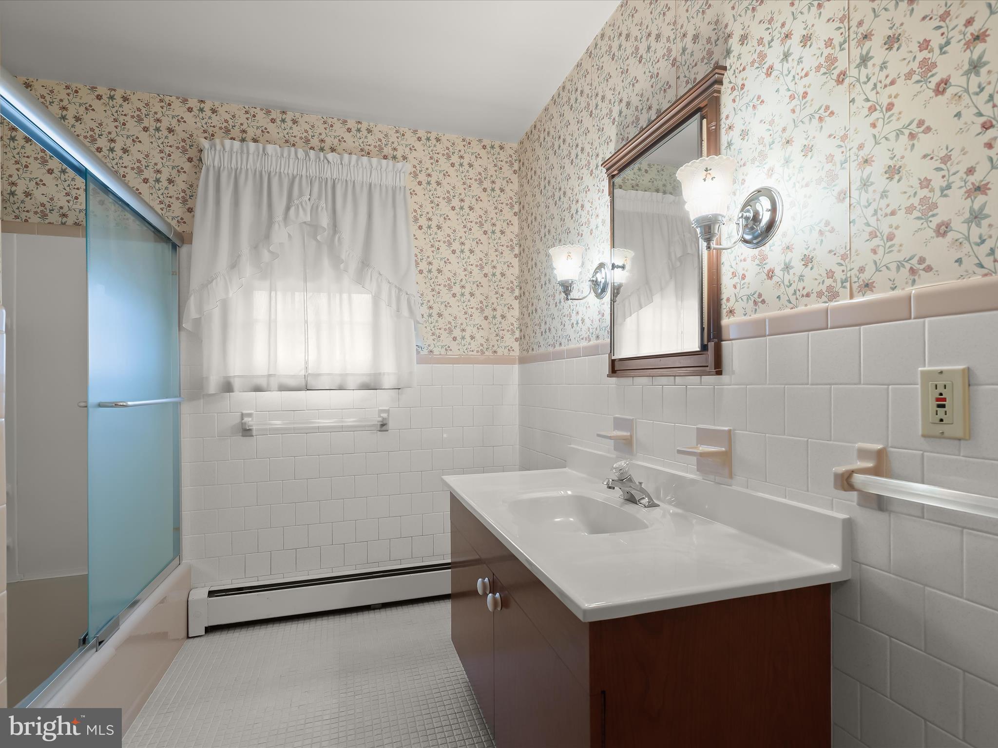 16215 Dark Hollow Road Upperco, MD 21155 - Photo 16 of 33 a bathroom with a sink and a mirror