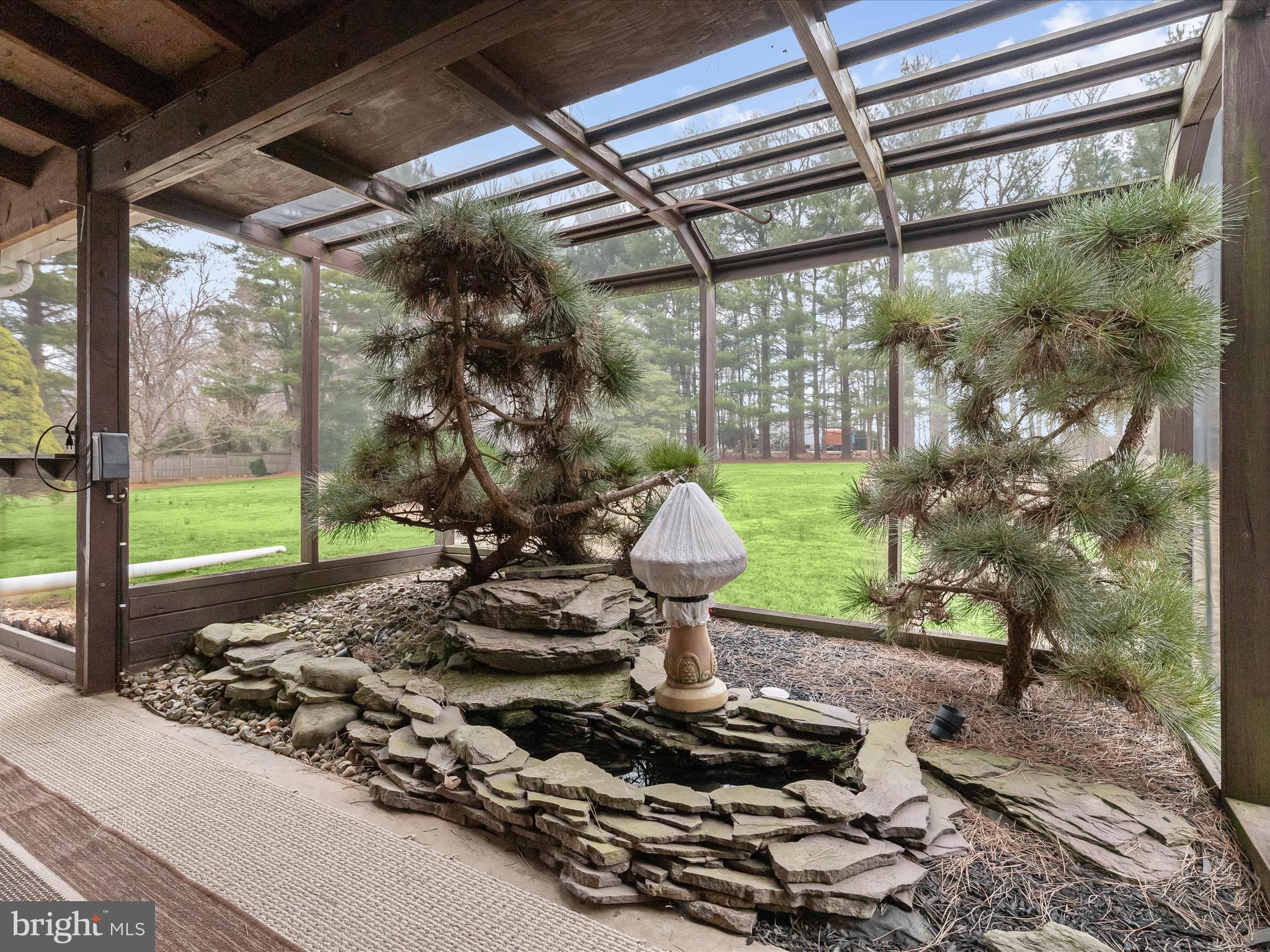 16215 Dark Hollow Road Upperco, MD 21155 - Photo 21 of 33 a room with lots of trees