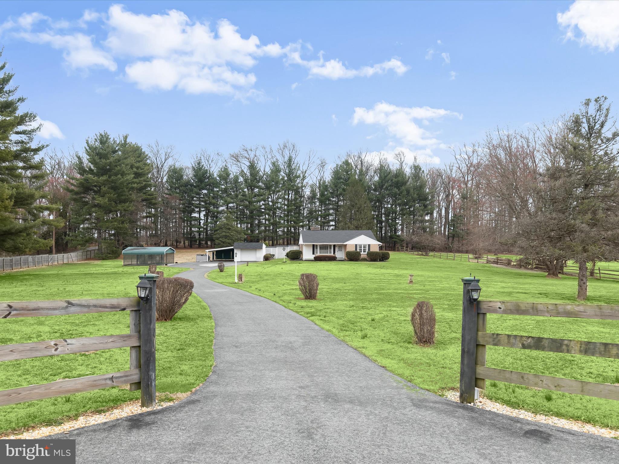 16215 Dark Hollow Road Upperco, MD 21155 - Photo 22 of 33 a view of a park with large trees