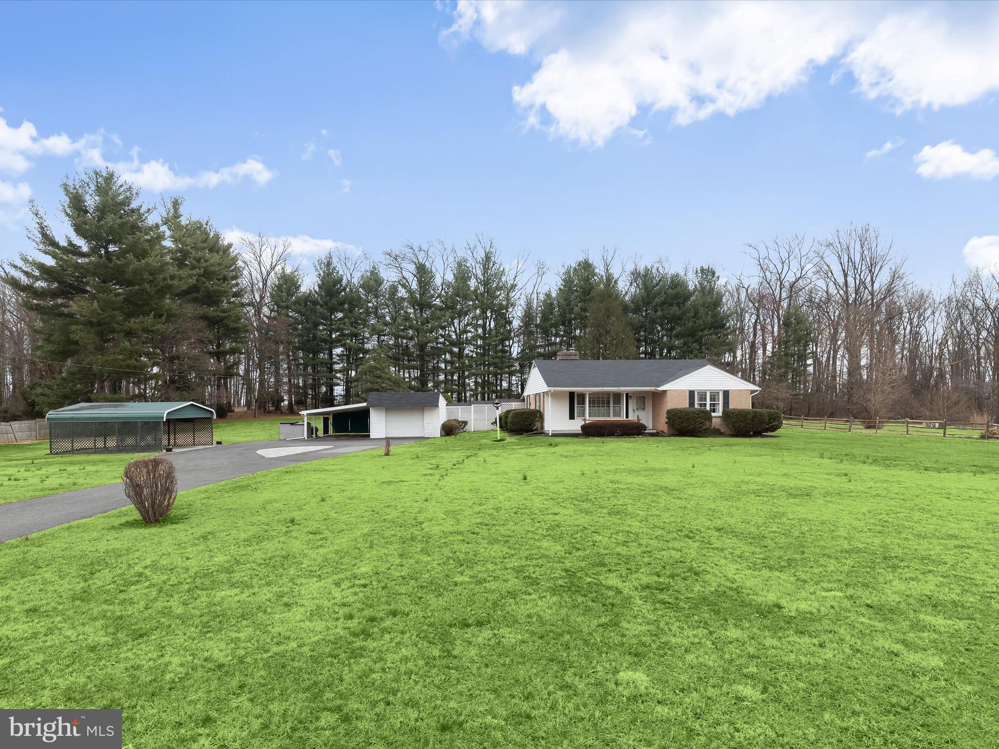 16215 Dark Hollow Road Upperco, MD 21155 - Photo 23 of 33 a view of a house with a yard