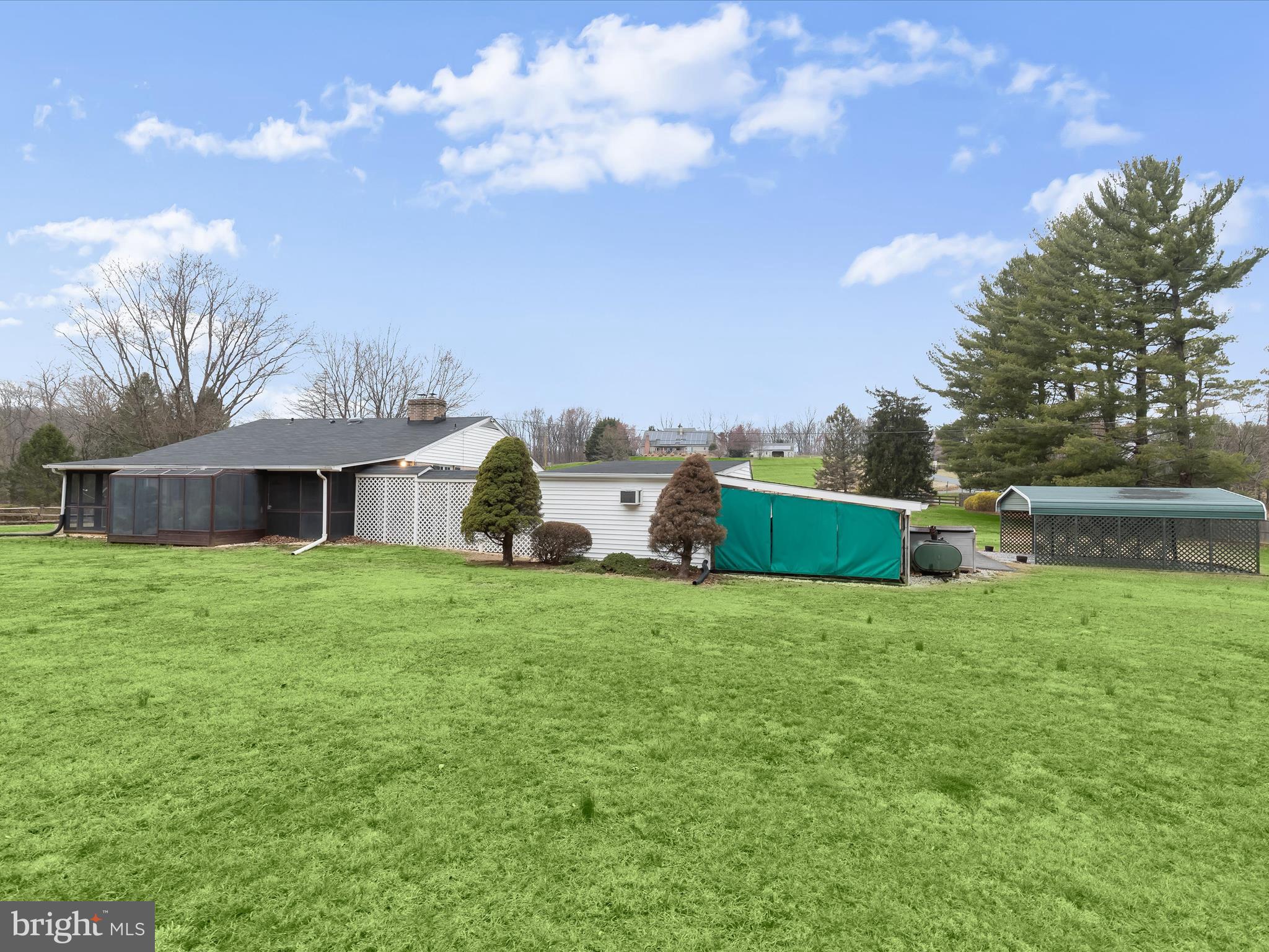 16215 Dark Hollow Road Upperco, MD 21155 - Photo 27 of 33 a view of a house with a big yard and a large tree