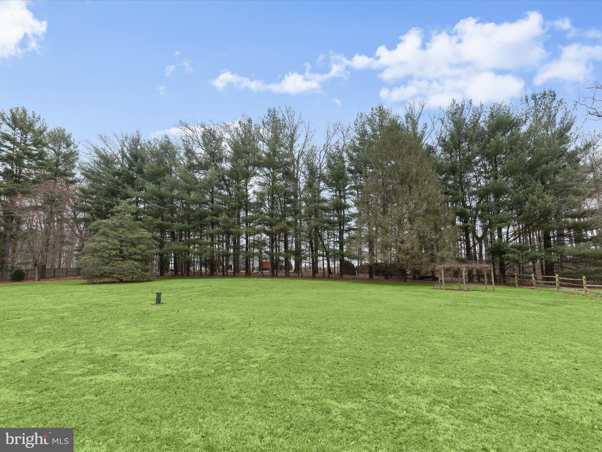 16215 Dark Hollow Road Upperco, MD 21155 - Photo 29 of 33 a view of a field with trees in the background