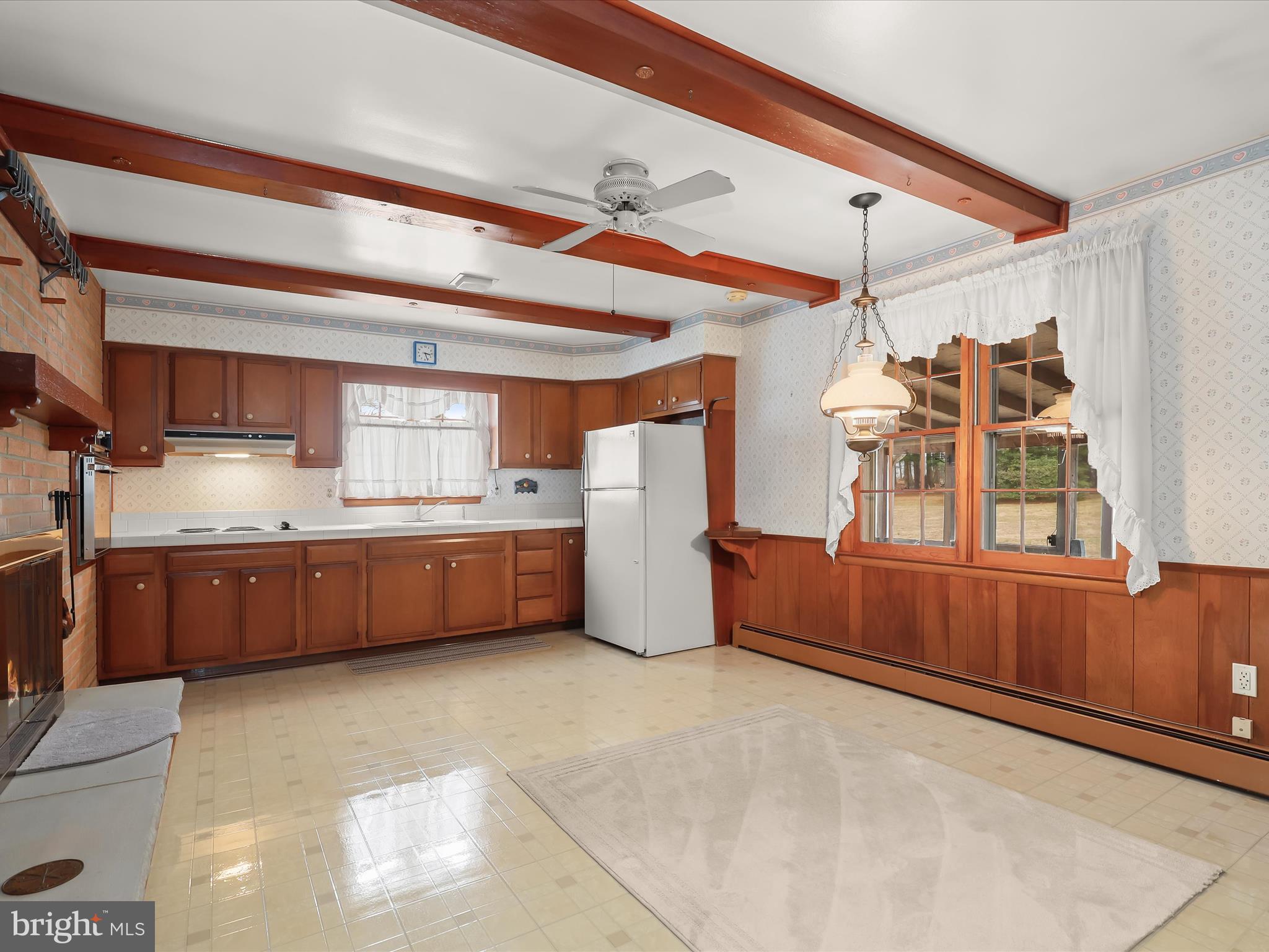 16215 Dark Hollow Road Upperco, MD 21155 - Photo 9 of 33 a kitchen with stainless steel appliances cabinets and a kitchen