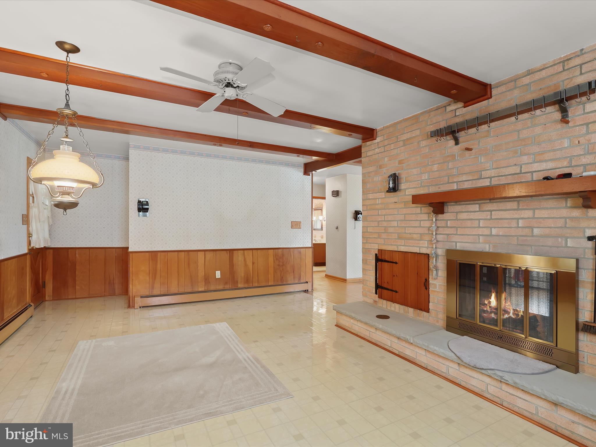 16215 Dark Hollow Road Upperco, MD 21155 - Photo 10 of 33 a view of a livingroom with furniture and a fireplace