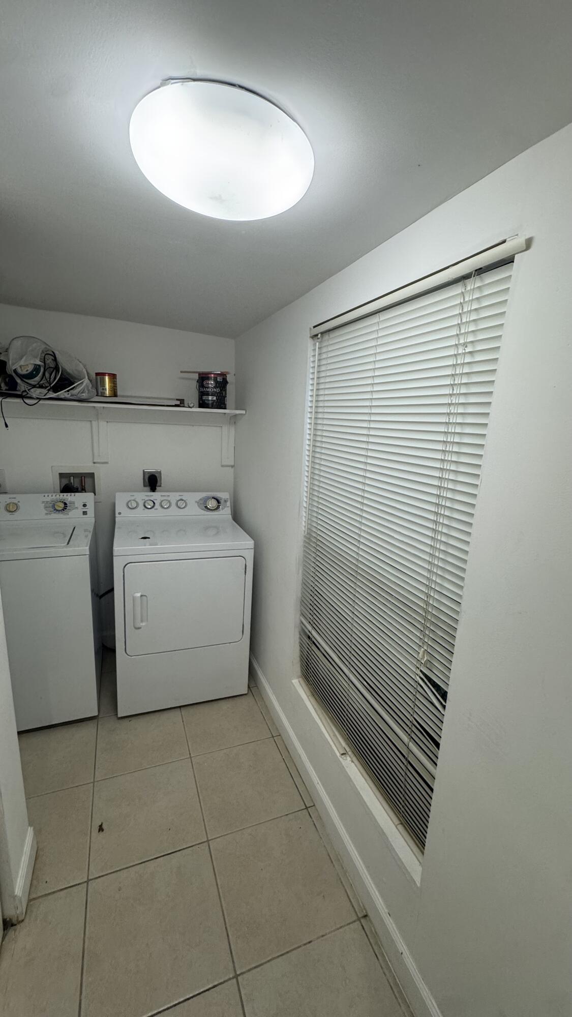 802 St Andrews Road, Unit 15 Hollywood, FL 33021 - Photo 25 of 53 a utility room with dryer and washer