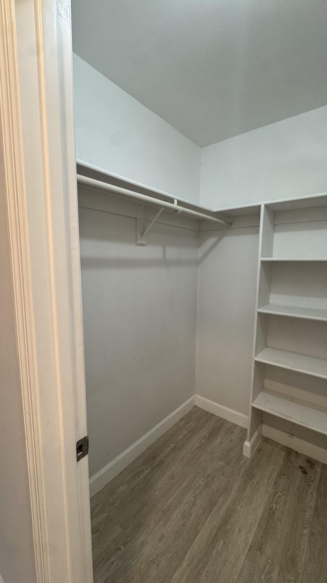 802 St Andrews Road, Unit 15 Hollywood, FL 33021 - Photo 30 of 53 a view of an empty walk in closet