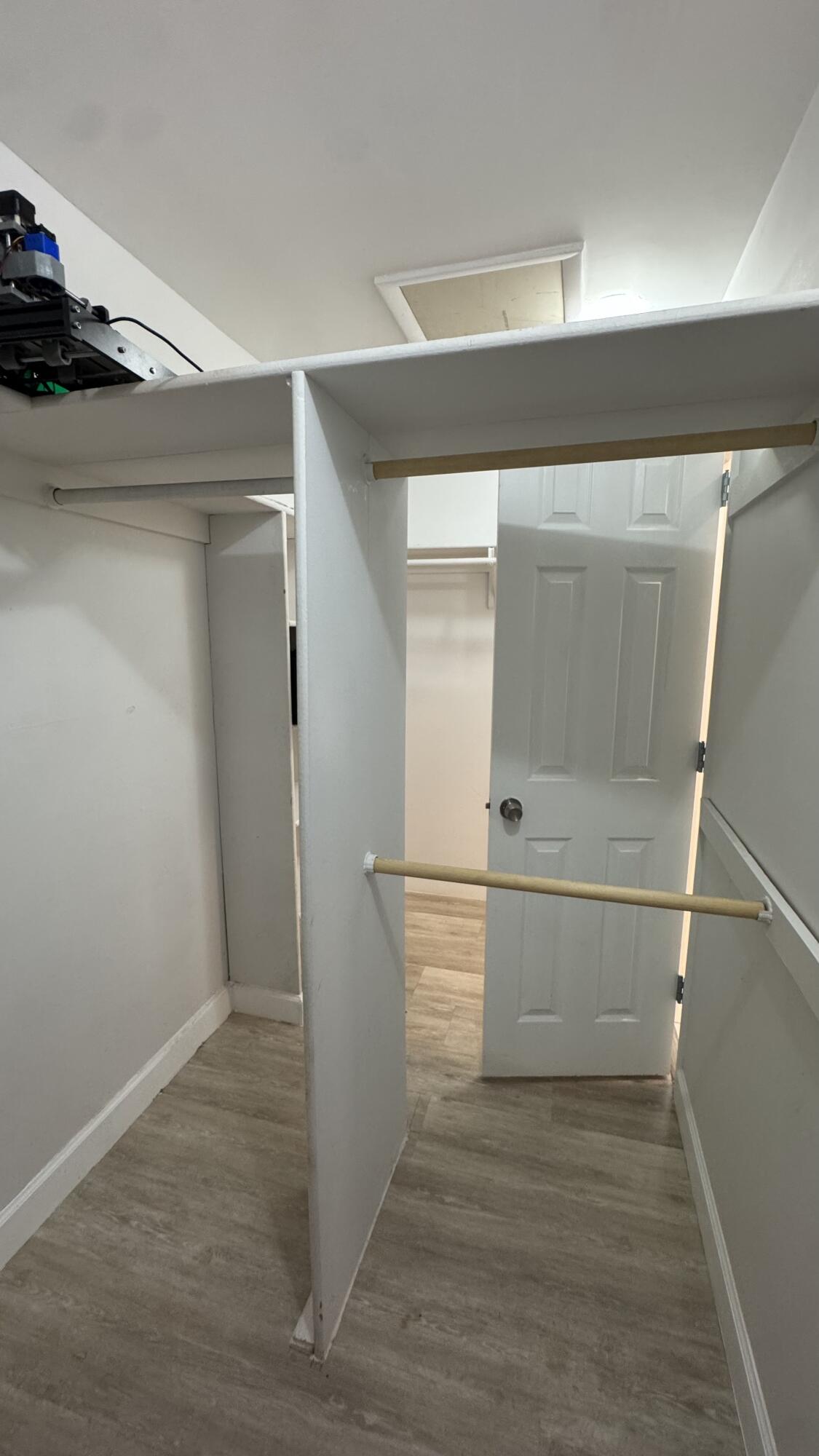 802 St Andrews Road, Unit 15 Hollywood, FL 33021 - Photo 31 of 53 a view of walk in closet with empty racks