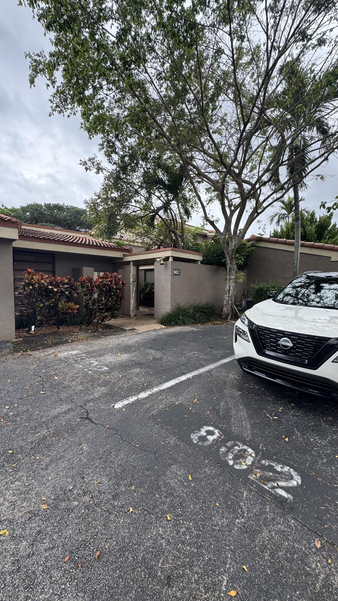 802 St Andrews Road, Unit 15 Hollywood, FL 33021 - Photo 4 of 53 a view of a car in front of a house