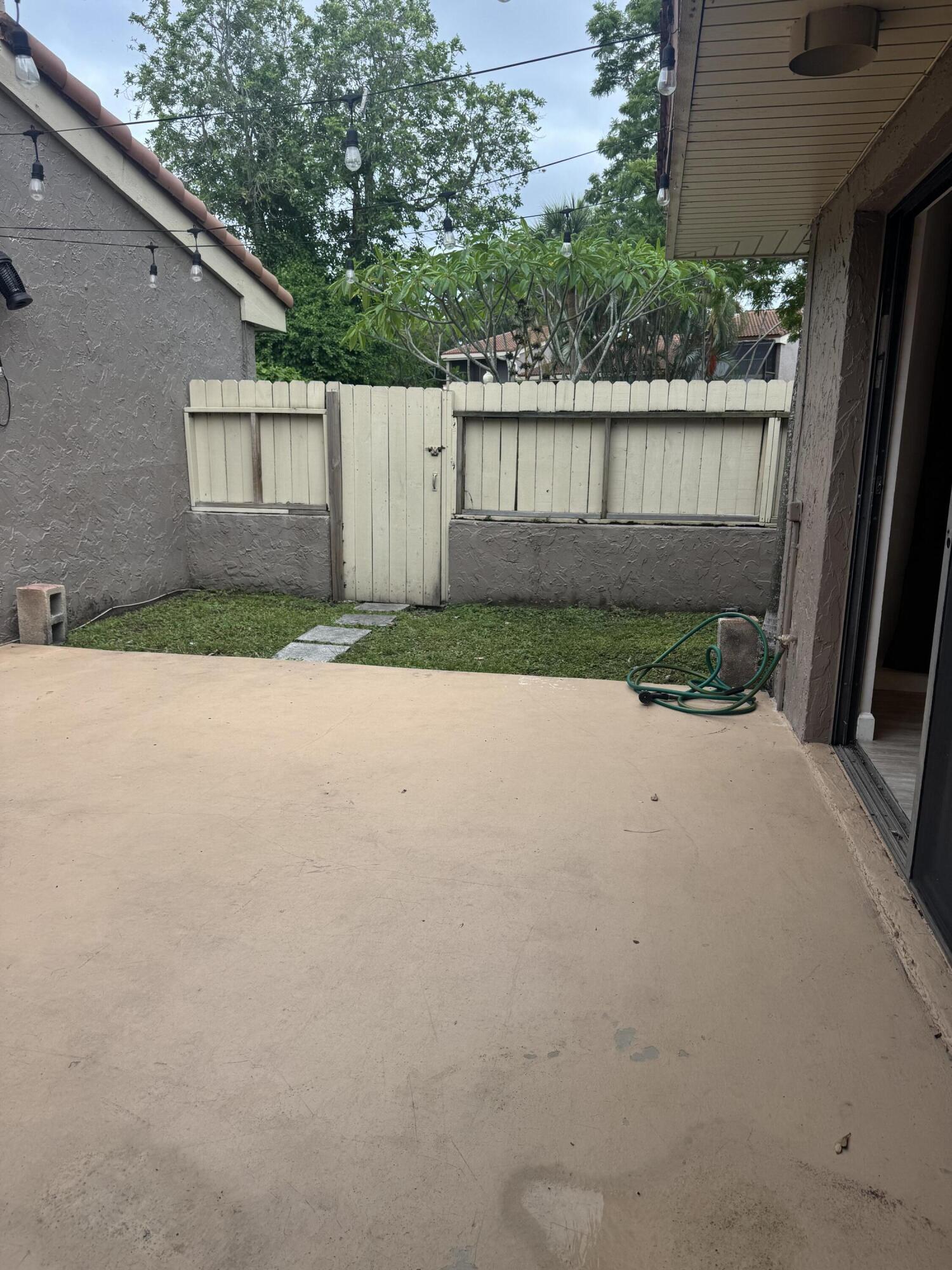 802 St Andrews Road, Unit 15 Hollywood, FL 33021 - Photo 51 of 53 a front view of a house with garden