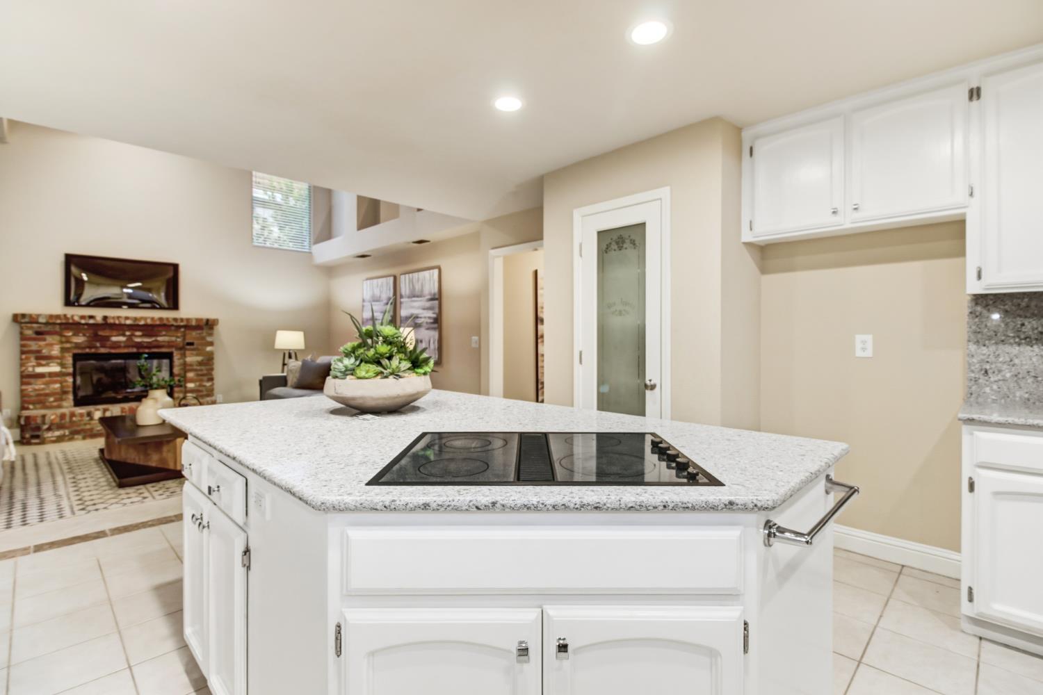 2760 Prestwick Drive Roseville, CA 95661 - Photo 21 of 45 a kitchen with a table and chairs in it