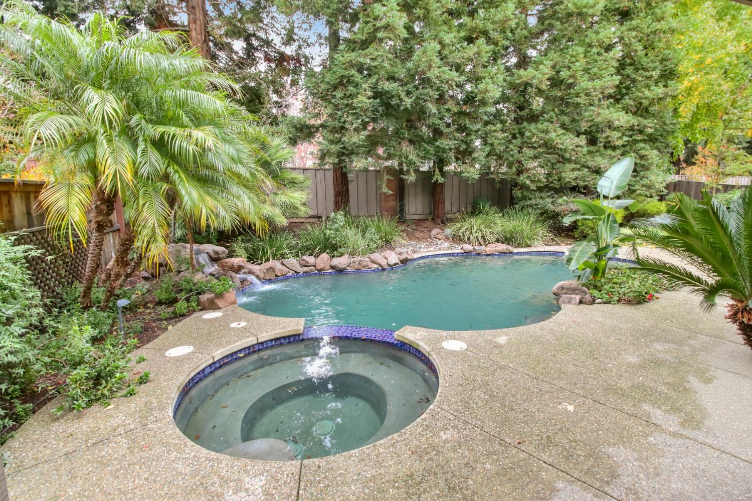 2760 Prestwick Drive Roseville, CA 95661 - Photo 37 of 45 a view of a swimming pool with a yard