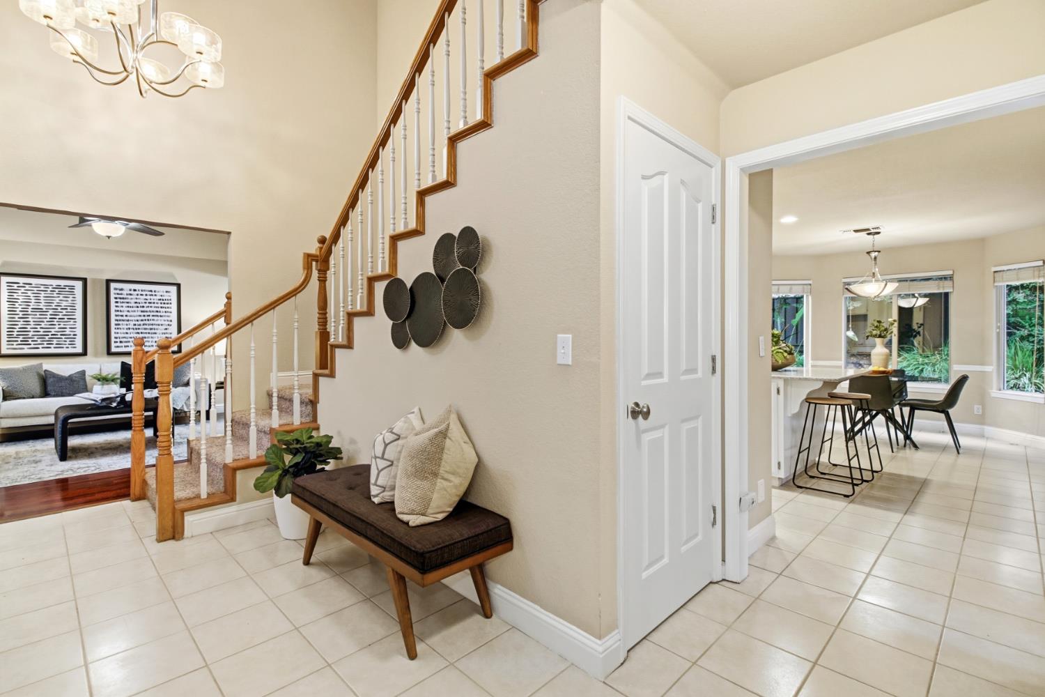 2760 Prestwick Drive Roseville, CA 95661 - Photo 4 of 45 a living room with furniture and a potted plant