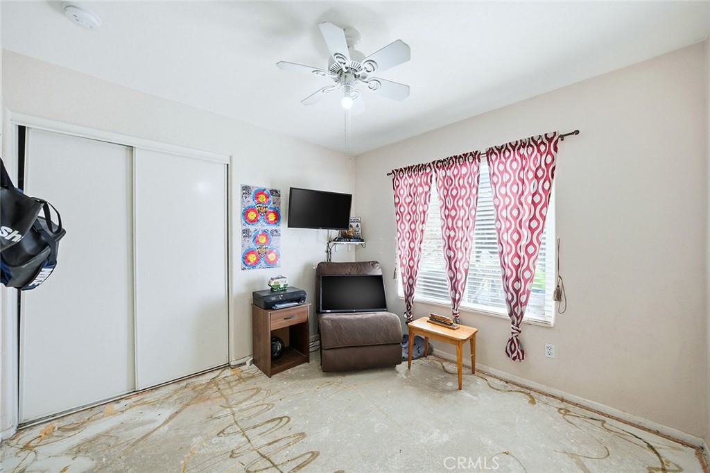 577 Cedar View Drive Beaumont, CA 92223 - Photo 18 of 44 Downstairs Bedroom - concrete floor