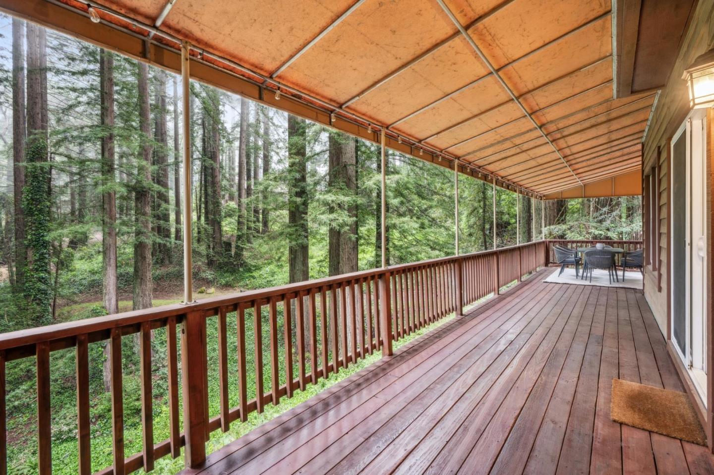 13872 Silver Sky Way Woodside, CA 94062 - Photo 60 of 78 a view of a balcony with wooden floor