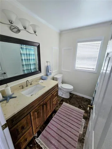 a bedroom with a bed furniture and a window