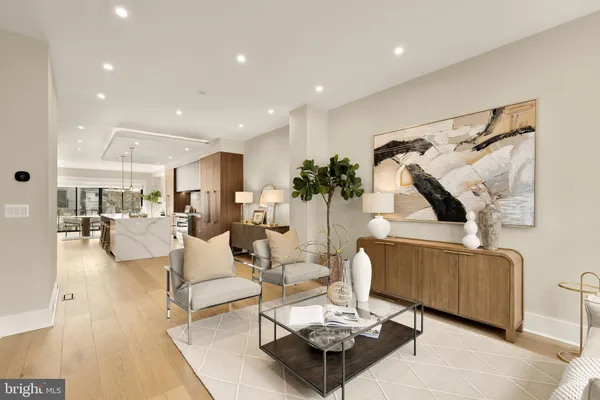 a living room with furniture and a table