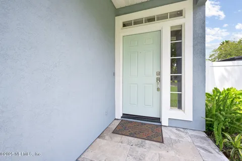 a view of a living room and hardwood floor