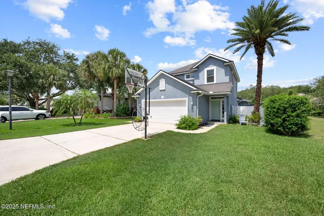 a view of a city with green space
