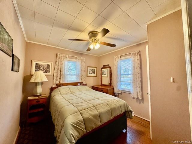 46 Salem Road Carmel, NY 10512 - Photo 11 of 21 a bedroom with a bed and a chandelier